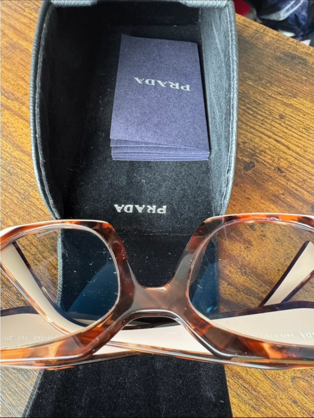 Prada Women’s Tortoiseshell Frame with Pink Temples Sunglasses - Picture 11 of 13